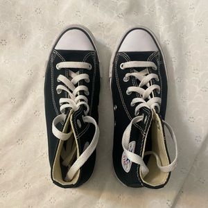 Black converse high tops . Worn once or twice excellent condition . Size 4